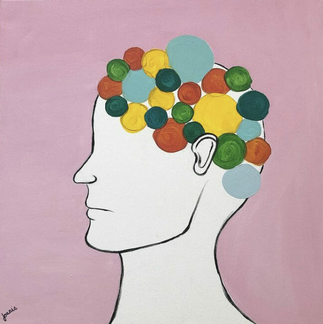drawing of head with colored dots for hair