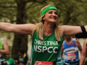 woman in green winning