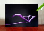 purple figure on black backgroud